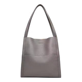 Sac à bandoulière simple de couleur unie