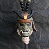 Pendentif voiture masque de démon samouraï assassin
