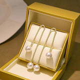 Boucles d'oreilles perles à pompon en strass