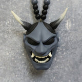 Pendentif voiture masque de démon samouraï assassin
