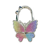 Crochet de sac pliable en forme de papillon