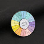 Broche en forme de roue tournante