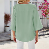 Chemise en mousseline de soie à col en V et à manches mi-longues, de couleur unie