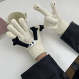 Gants magnétiques pour le maintien des mains