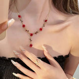 Ensemble de bijoux élégant avec collier et boucles d'oreilles en forme de fleur de rose