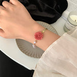 Bracelet de luxe en perles de rose rouge