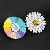 Broche en forme de roue tournante