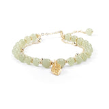 Boucles d'oreilles en rameaux d'or et feuilles de jade