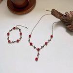 Ensemble de bijoux élégant avec collier et boucles d'oreilles en forme de fleur de rose