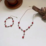 Ensemble de bijoux élégant avec collier et boucles d'oreilles en forme de fleur de rose