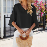 Chemise en mousseline de soie à col en V et à manches mi-longues, de couleur unie
