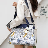 Sac maman portable avec plusieurs poches et grande capacité