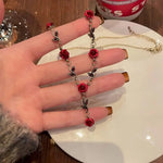 Ensemble de bijoux élégant avec collier et boucles d'oreilles en forme de fleur de rose