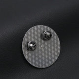 Broche en forme de roue tournante
