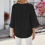 Chemise en mousseline de soie à col en V et à manches mi-longues, de couleur unie