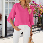 Chemise en mousseline de soie à col en V et à manches mi-longues, de couleur unie