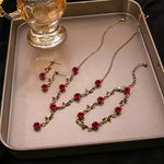 Ensemble de bijoux élégant avec collier et boucles d'oreilles en forme de fleur de rose