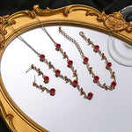 Ensemble de bijoux élégant avec collier et boucles d'oreilles en forme de fleur de rose