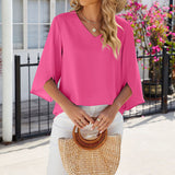 Chemise en mousseline de soie à col en V et à manches mi-longues, de couleur unie