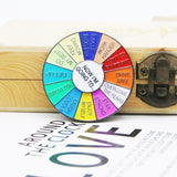Broche en forme de roue tournante