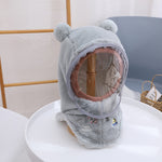Bonnet polaire à capuche avec visière coupe-vent