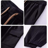 Pantalon de travail multi-poches à cordon de serrage