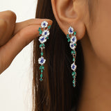 Boucles d'oreilles en chaîne à fleurs bleues