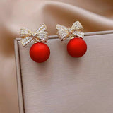Boucles d'oreilles en perles papillon rouges
