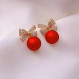 Boucles d'oreilles en perles papillon rouges