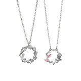 Collier de fleurs de rose de ronce