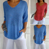 Tricot à col en V dans des couleurs unies