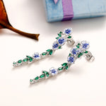 Boucles d'oreilles en chaîne à fleurs bleues