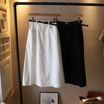 Jupe mi-corps A-line de couleur unie