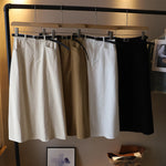 Jupe mi-corps A-line de couleur unie