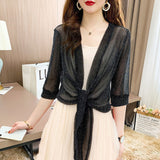Cardigan scintillant en tissu fin de soie