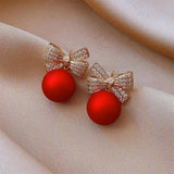 Boucles d'oreilles en perles papillon rouges