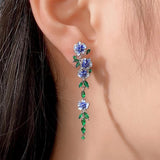 Boucles d'oreilles en chaîne à fleurs bleues