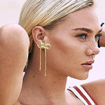 Boucles d'oreilles longues avec nœud