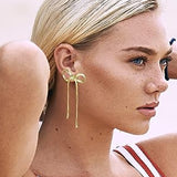 Boucles d'oreilles longues avec nœud