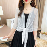 Cardigan scintillant en tissu fin de soie