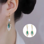 Boucles d'oreilles en rameaux d'or et feuilles de jade