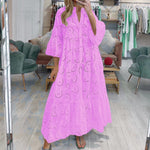 Robe en dentelle à manches évasées et col en V