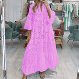 Robe en dentelle à manches évasées et col en V
