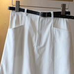 Jupe mi-corps A-line de couleur unie