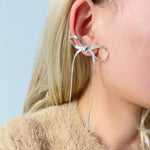 Boucles d'oreilles longues avec nœud