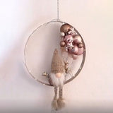 Plaques de porte décorées par un gnome de Noël DIY