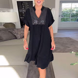 Robe plissée ample à col en V