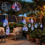 Guirlande lumineuse avec ampoules suspendues à des cordes de jute