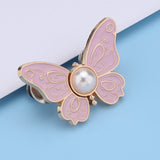 Boucle de taille papillon perle