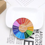 Broche en forme de roue tournante